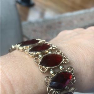 Gold with ruby stone . Very elegant👌